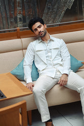 White Suit with Draping Style Panel